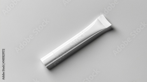 A white tube of lip gloss.