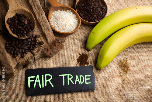 A Fair Trade Still Life Featuring Coffee, Rice, Cacao Nibs, Bananas, and a Rustic Setting