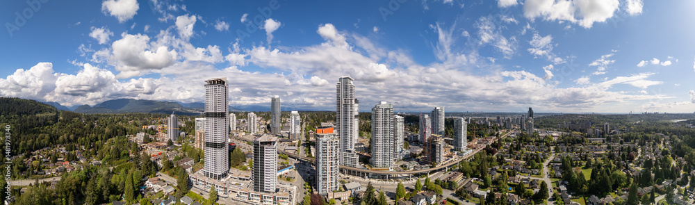 Obraz premium Panoramic View of Burnaby's Skyline on a Bright Sunny Day in British Columbia
