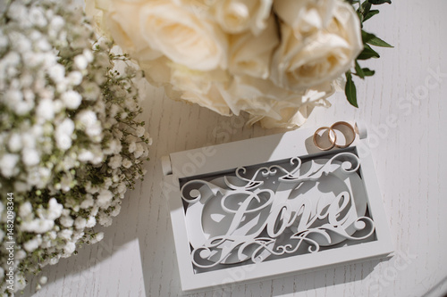 Wedding day. Wedding bouquets, bride's rings, invitations. Preparation. Bride's morning