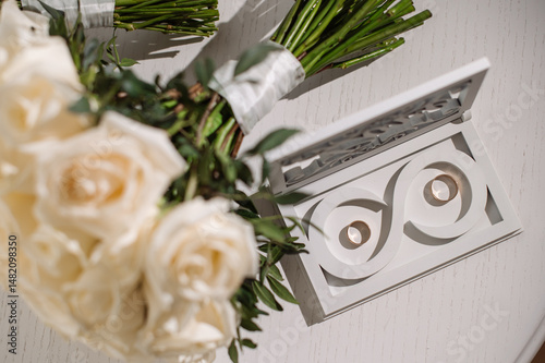 Wedding day. Wedding bouquets, bride's rings, invitations. Preparation. Bride's morning