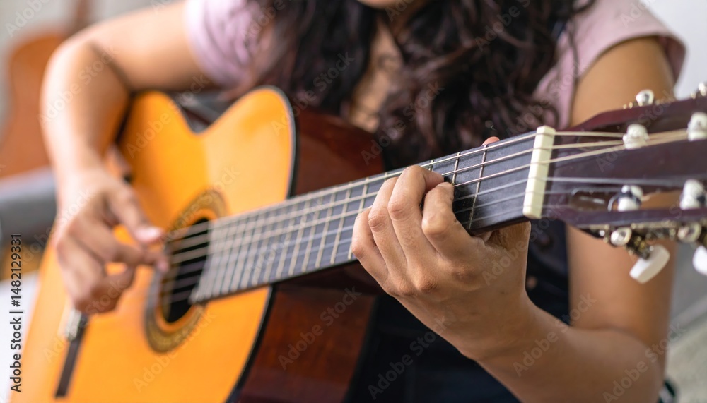 Obraz premium guitar in the hands of a musician.