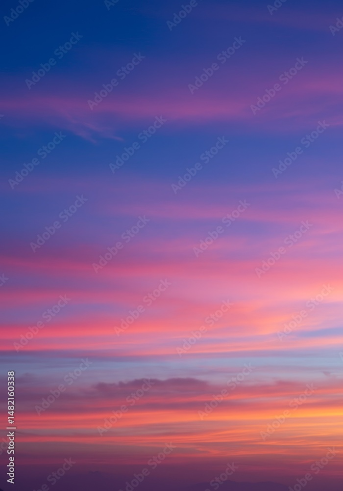 Fototapeta premium Photo Vibrant Pink Orange and Blue Sunset Sky