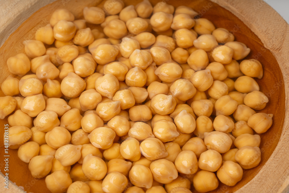 Soaked chickpeas, chick pea in water, swollen wet Cicer arietinum fruits, garbanzo beans cooking Soaked chickpeas, chick pea in water, swollen wet Cicer arietinum fruits, garbanzo beans cooking