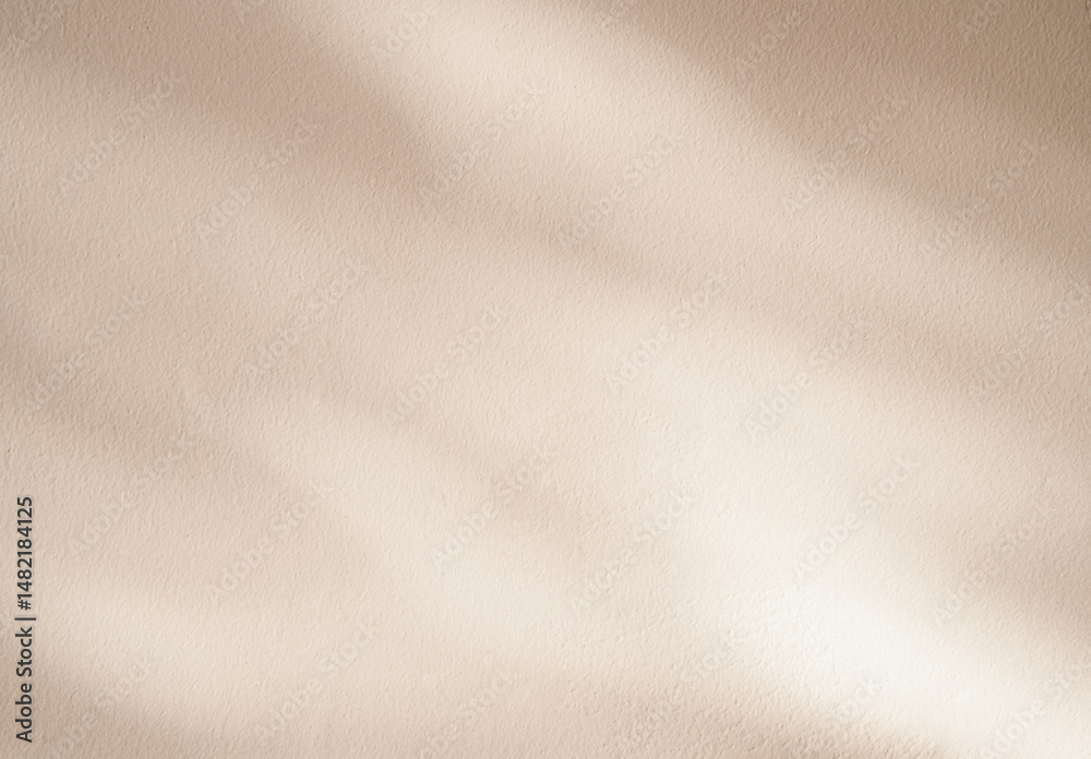 Fototapeta premium Shadow and light on wall concrete background for Autumn banner,Studio room with nature bright sunlight, shadow leaf on floor cement texture,Abstract background cream pastel colour for Fall season