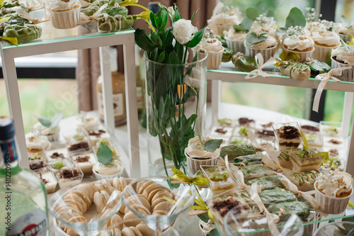 Wedding day. Buffet table with various types of snacks and sweets in the celebration hall