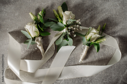 Wedding day. Bouquets and various wedding accessories, shoes, invitations, rings in the morning at the bride's preparation