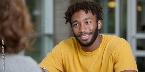 Student consulting financial advisor for educational assistance and planning