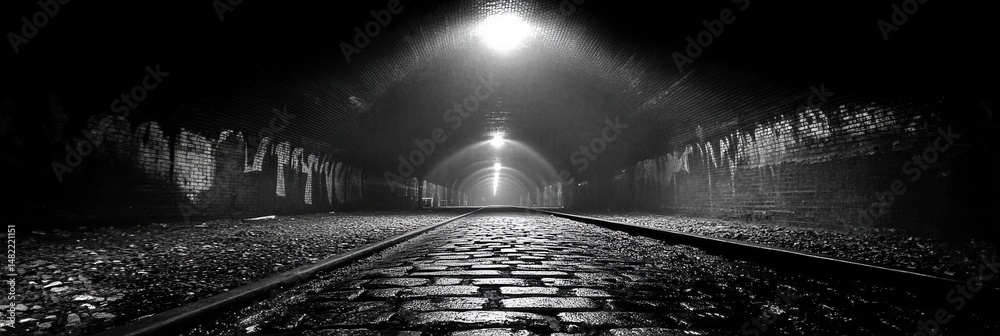 Fototapeta premium Dark Brick Tunnel Railroad Tracks Light Mysterious Urban Scene art city path mood grey black white