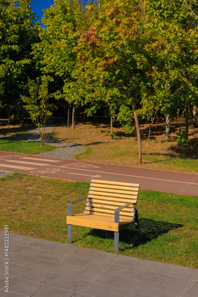 Wooden benches and chaise lounges for rest on the streets of the city and in the park, public places Wooden benches and chaise lounges for rest on the streets of the city and in the park, public places