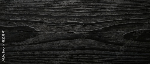 Elegant Black Wood Grain Texture with Subtle Detailing