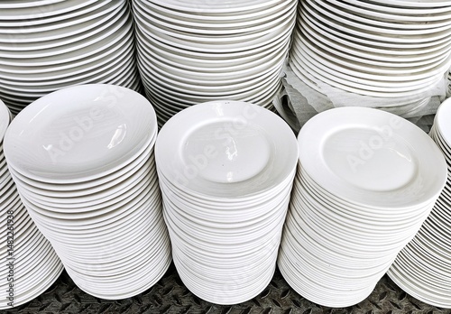Stack of various Ceramic Mugs.