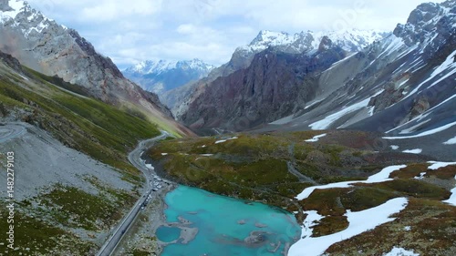 Snowy mountains along Xinjiang Dukku Highway exploring breathtaking landscapes