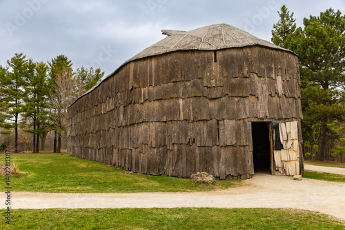 A long house in a reconstructed 15th century Iroquoian village. Milton, Crawford Lake, Ontario, Canada.