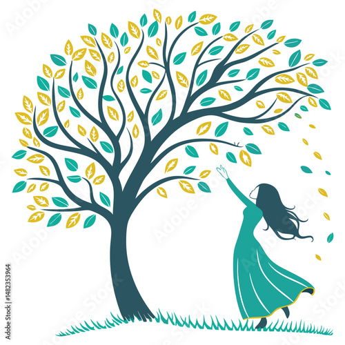 Woman in green dress reaching for falling autumn leaves