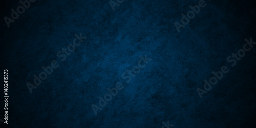Blue background with grunge backdrop texture, watercolor painted mottled blue background, colorful bright ink and watercolor textures on black paper background.	
