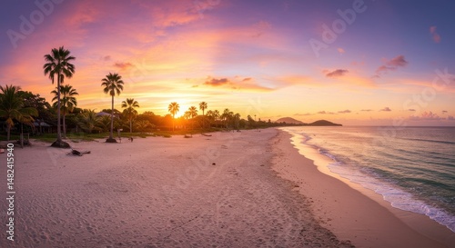 Serene sunset over a tranquil beach with palm trees and gentle waves