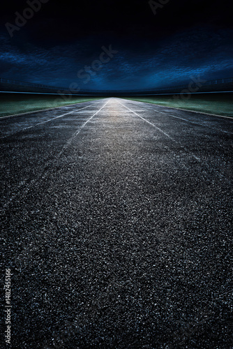 Obraz na płótnie This visually striking image captures a deserted track under a dramatic sky, evoking a sense of solitude and the endless pursuit of dreams and ambitions. w salonie