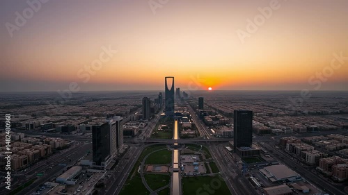 Futuristic riyadh cityscape at golden hour a drones eye view of modern urban development and infrastructure