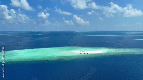 Summer lagoon Ripples in the sand at low tide on a beach with sandbar and blue sea in Maldives island