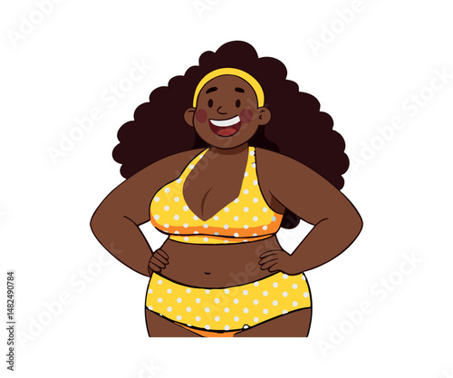 A cheerful African-American girl in a yellow swimsuit. Vacation, summer lifestyle
