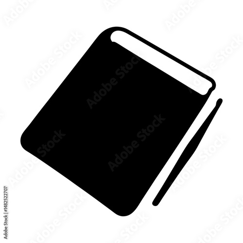 Black and white image depicting a book and pen lying on a surface
