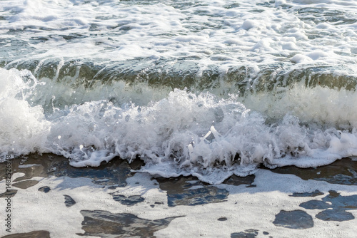 waves on the sandy beach of Cyprus..