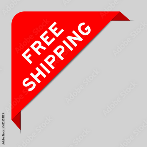Red color of corner label banner with word free shipping on gray background
