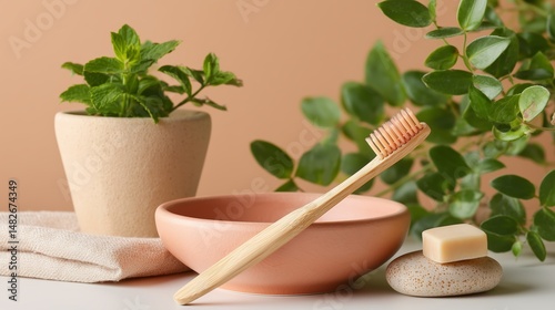 Natural bathroom setting with bamboo toothbrush, soap, and greenery for an eco-friendly routine