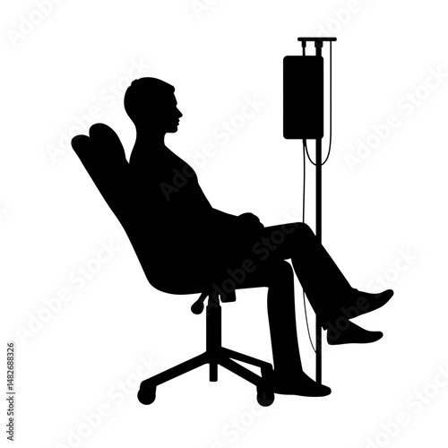 Man sitting in chair receiving medical treatment with IV drip  