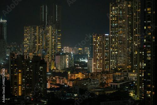 Wallpaper Mural Cinematic view of Mumbai city at night. Mumbai's iconic financial district with this stunning cityscape view. Shot of Mumbai Skyline, high-rise buildings at South Mumbai, Maharashtra India. Torontodigital.ca