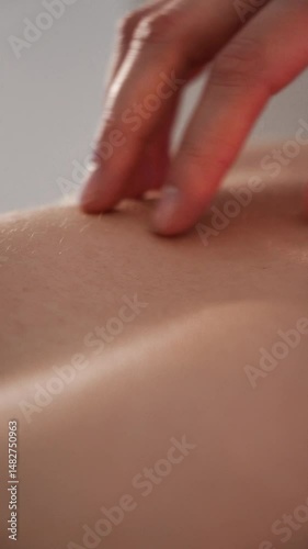 Wallpaper Mural close-up of sliding fingers on the back Torontodigital.ca