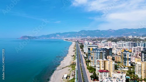 Aerial Hyperlapse of Alanya City, Castle, and Coastline on a Sunny Day