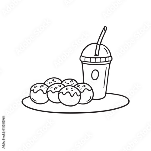 A takoyaki beside a cold drink on a table in the park