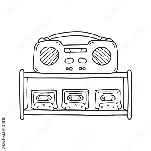 A tape recorder placed beside cassette tapes on a wooden shelf