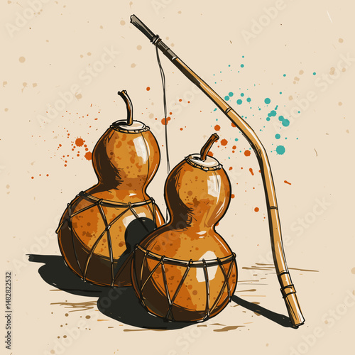 Dried gourds used as musical instruments with a stick on a textured background with artistic splashes