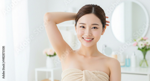 わき脱毛・ムダ毛処理の美容素材に最適な若い女性。美しい脇。
