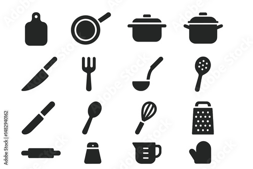 Kitchen utensils and tools arranged on a plain background for culinary activities and cooking preparation
