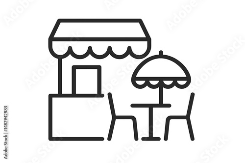 Outdoor cafe setup with a small table and chairs under an umbrella in a sunny environment