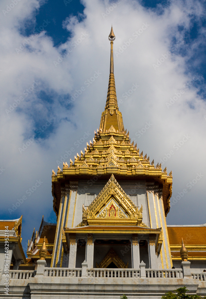 Fototapeta premium Thailand architecture of beautiful colorful buddhist temples. Religious sacred places in Thailand, thai buddhism and classic stupa and pagoda decoration with golden figures, flowers and colorful paint