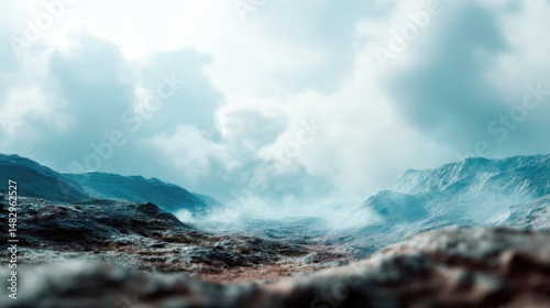 Moody landscape featuring fog, rock formations, and cloudy sky creating an atmospheric and abstract nature scene