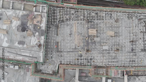 Aerial View of a Construction Site with Workers

