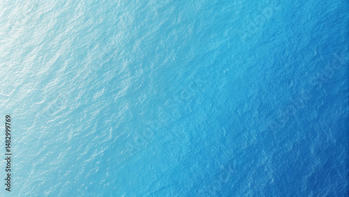 Fototapeta Naklejka Na Ścianę i Meble -  Aerial view of clear ocean water with texture and gradual color change