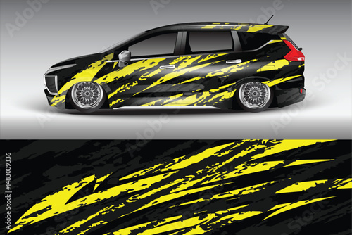 Stylish black and yellow car wrap design showcasing sleek vehicle