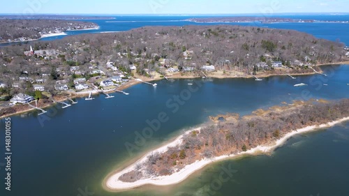 Drone footage of Bird Island between Northport Bay and Centerport Harbor, showing coastal homes, marinas, and the shoreline of Long Island’s North Shore on a peaceful sunny day.