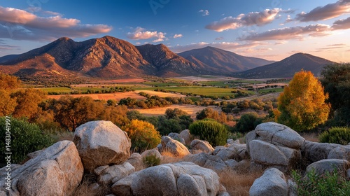 Valley vista mountains and goldenhued farmland photo