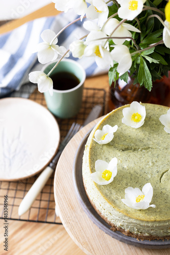 beautiful, appetizing mint cheesecake decorated with flowers