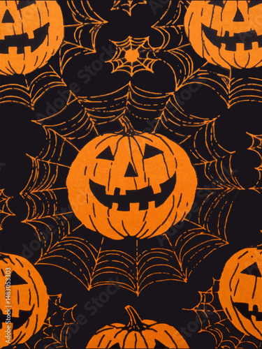 Orange pumpkin and spider web on black background. Halloween background.