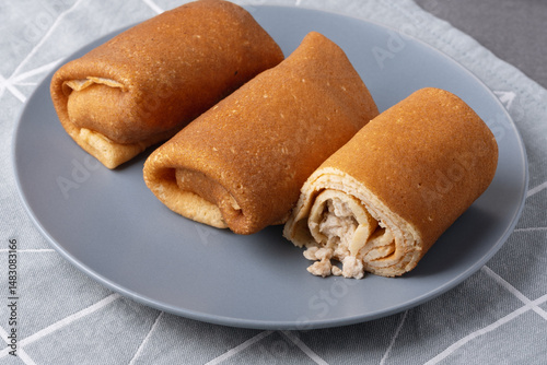 Homemade savory pancakes stuffed with meat