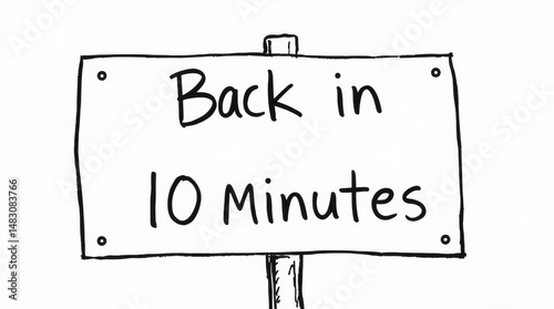 A hand-drawn sign reads, 